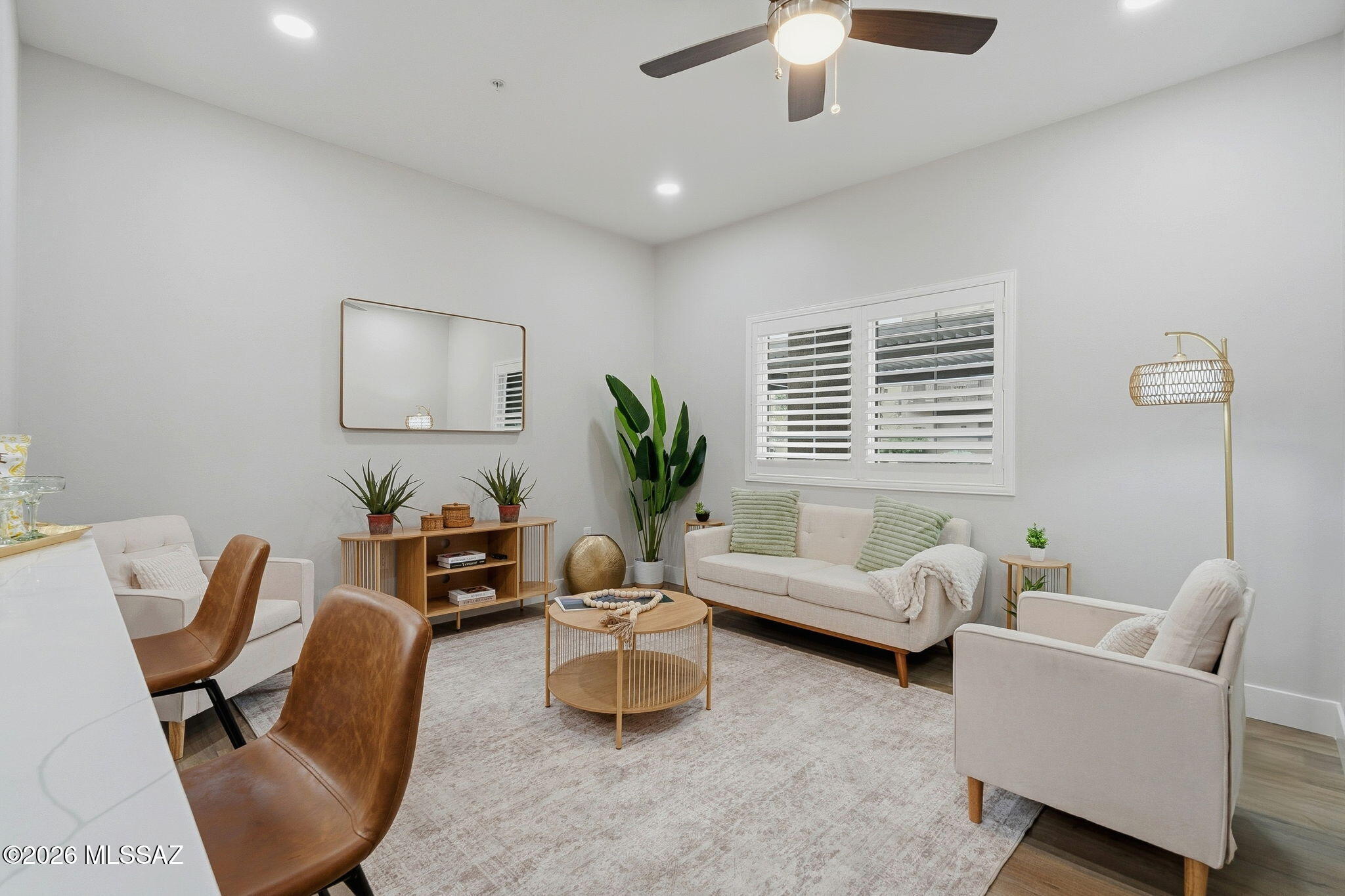 2020 East River Road, Unit 101 Tucson, AZ 85718 - Photo 1 of 12 a living room with furniture