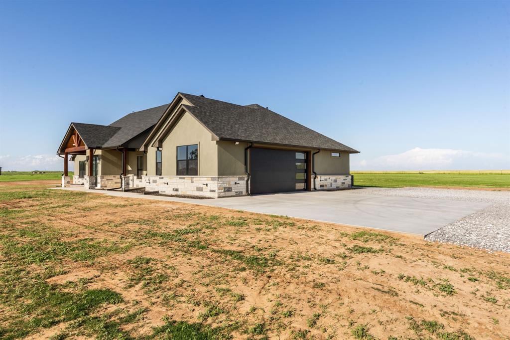 2311 Parker Road Wichita Falls, TX 76310 - Photo 6 of 32 a front view of a house with a yard