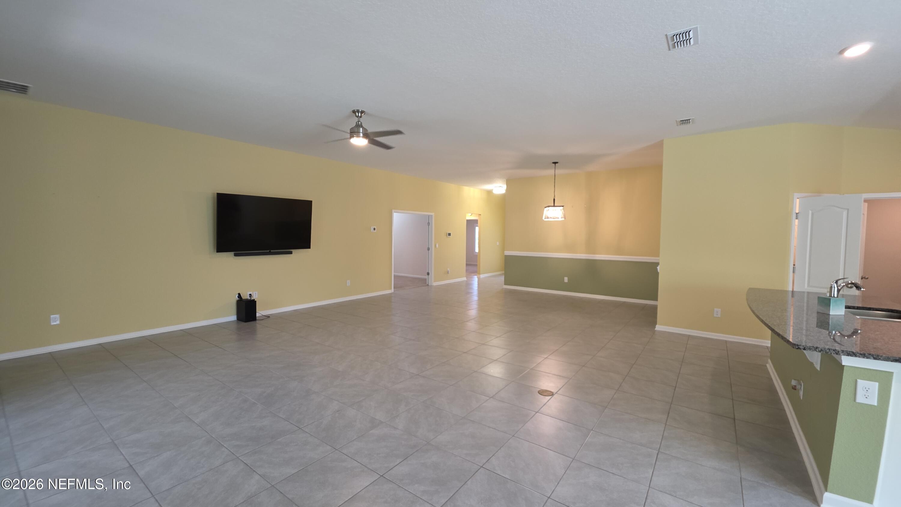 70 Oakleaf Way Palm Coast, FL 32137 - Photo 2 of 31 living area 1