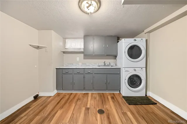a view of a kitchen with washer and dryer