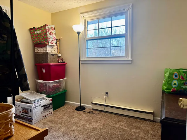 an entryway with a workspace