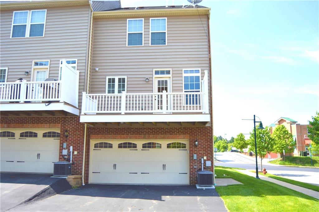 2001 Village Run Road Wexford, PA 15090 - Photo 20 of 25 Exterior back with deck and double garages.