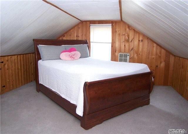 21 Rhodes Avenue Bay Shore, NY 11706 - Photo 5 of 6 a bedroom with a bed and window