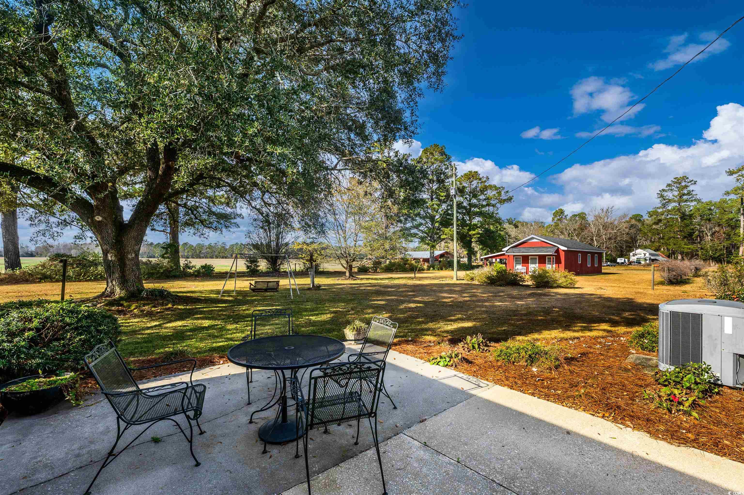 1870 Highway 348 Loris, SC 29569 - Photo 26 of 34 View of patio / terrace with outdoor dining area