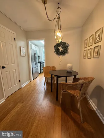 a view of a livingroom with furniture and wooden floor