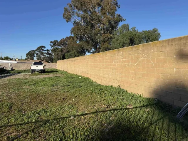 a view of a field with an outdoor space