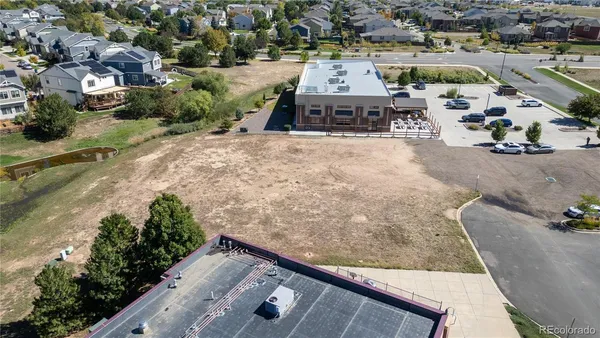 an aerial view of a house with a outdoor space