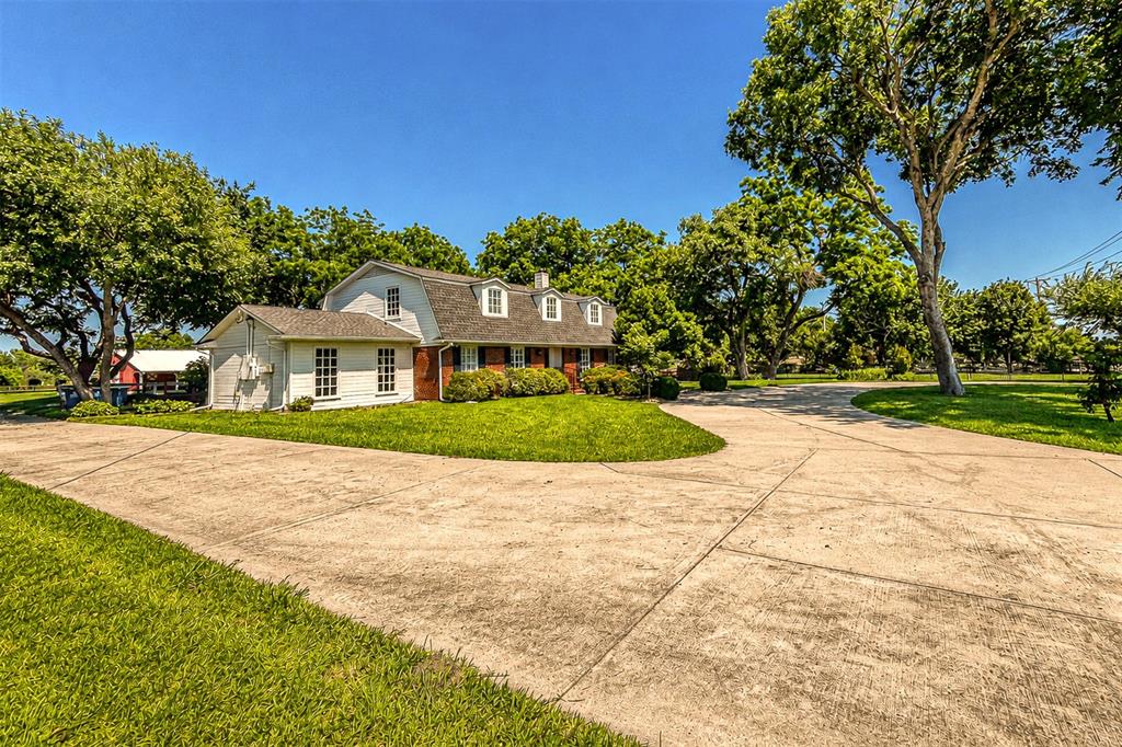 9310 Merritt Road Rowlett, TX 75089 - Photo 35 of 40 a view of house with yard