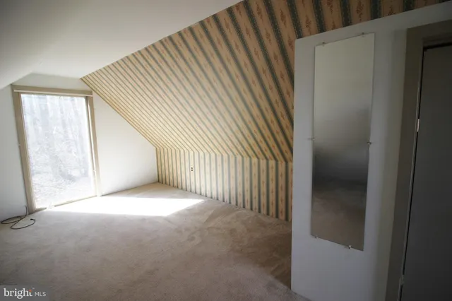 a view of a livingroom with a window