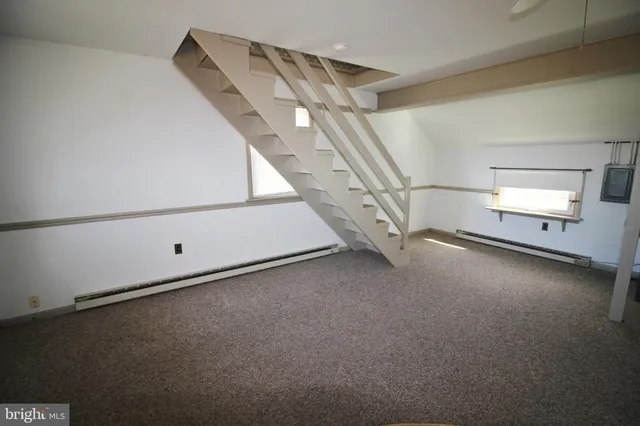 a view of a room with an empty space