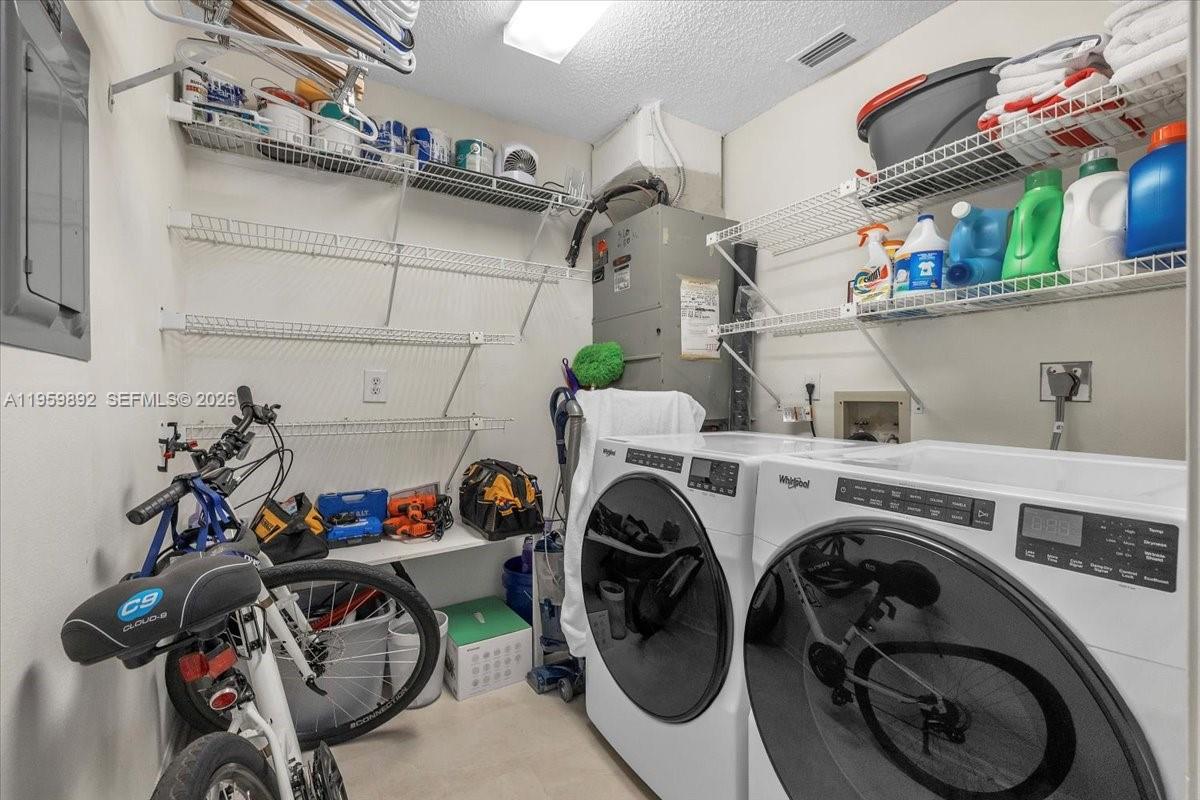 280 Timber Lake Circle, Unit 201 Naples, FL 34104 - Photo 20 of 34 a view of storage and utility room