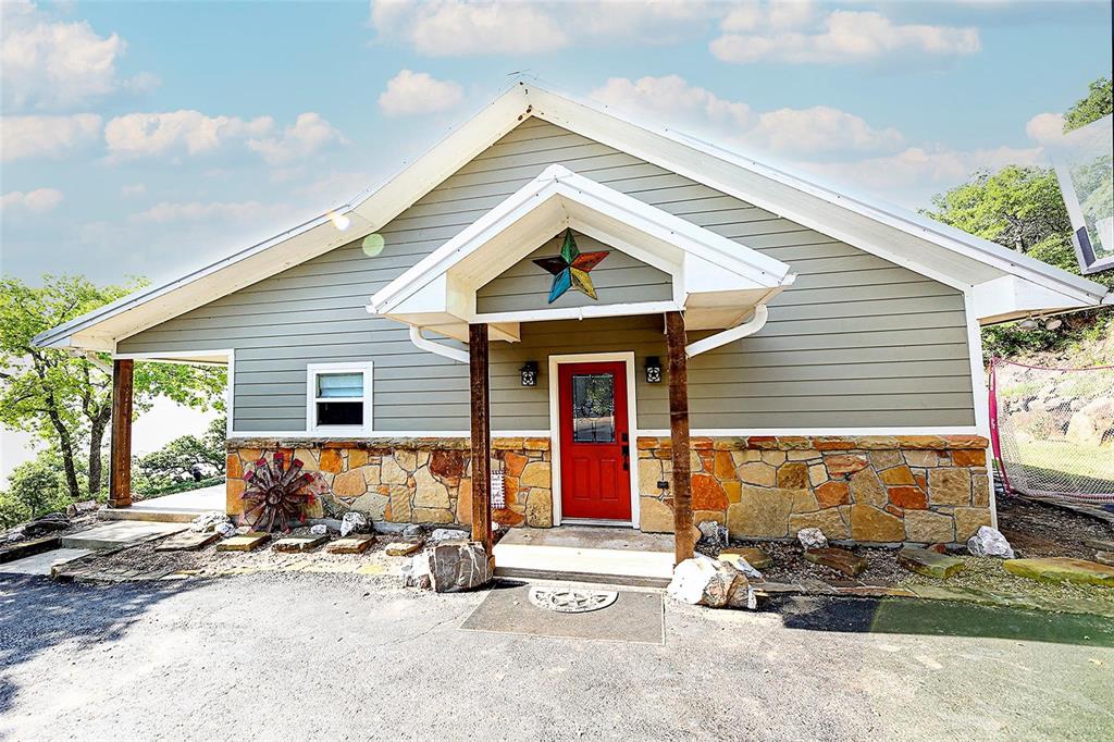 a view of a house with patio outdoor seating area