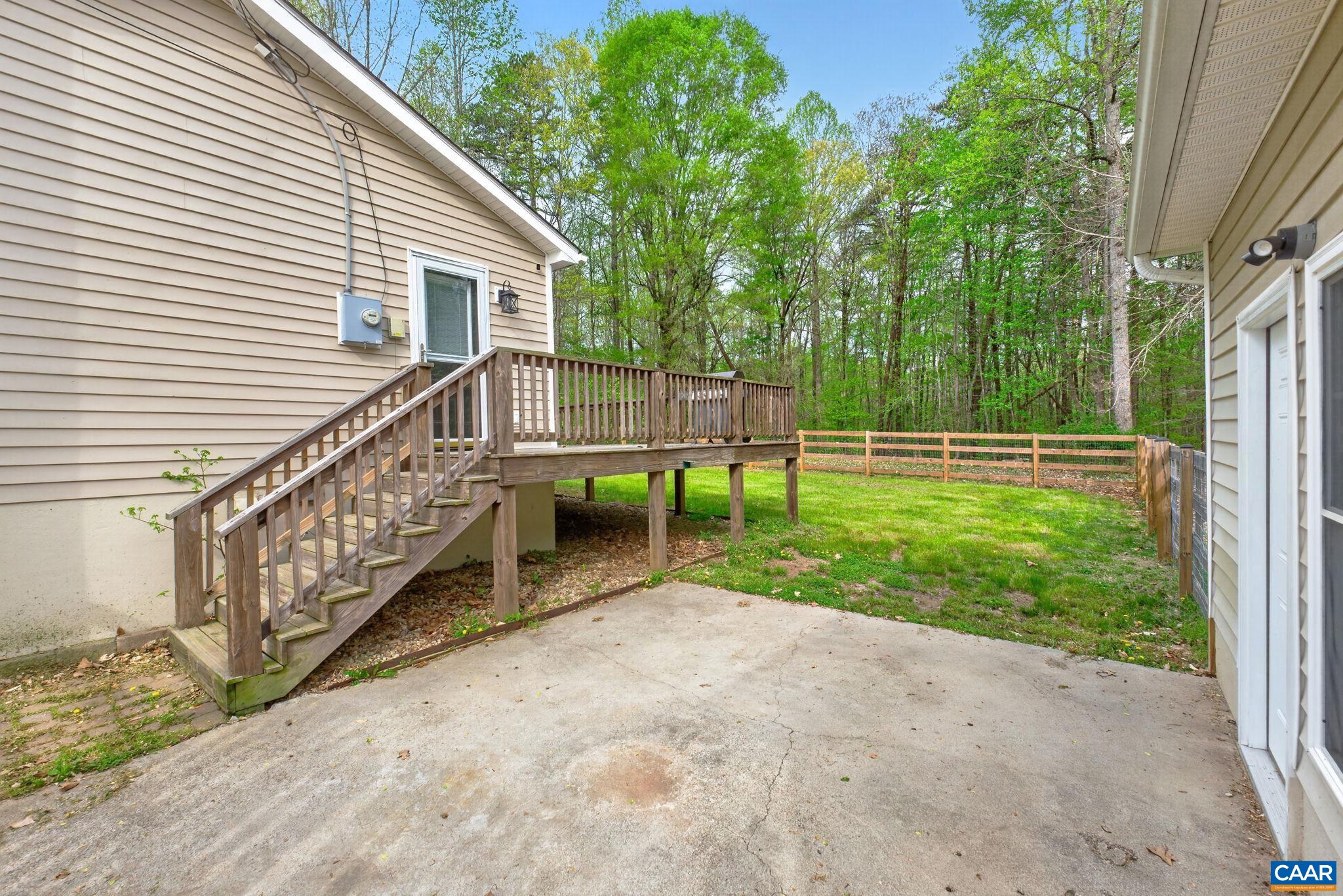 673 Cedar Lane Road Palmyra, VA 22963 - Photo 38 of 47 a view of a house with backyard and deck