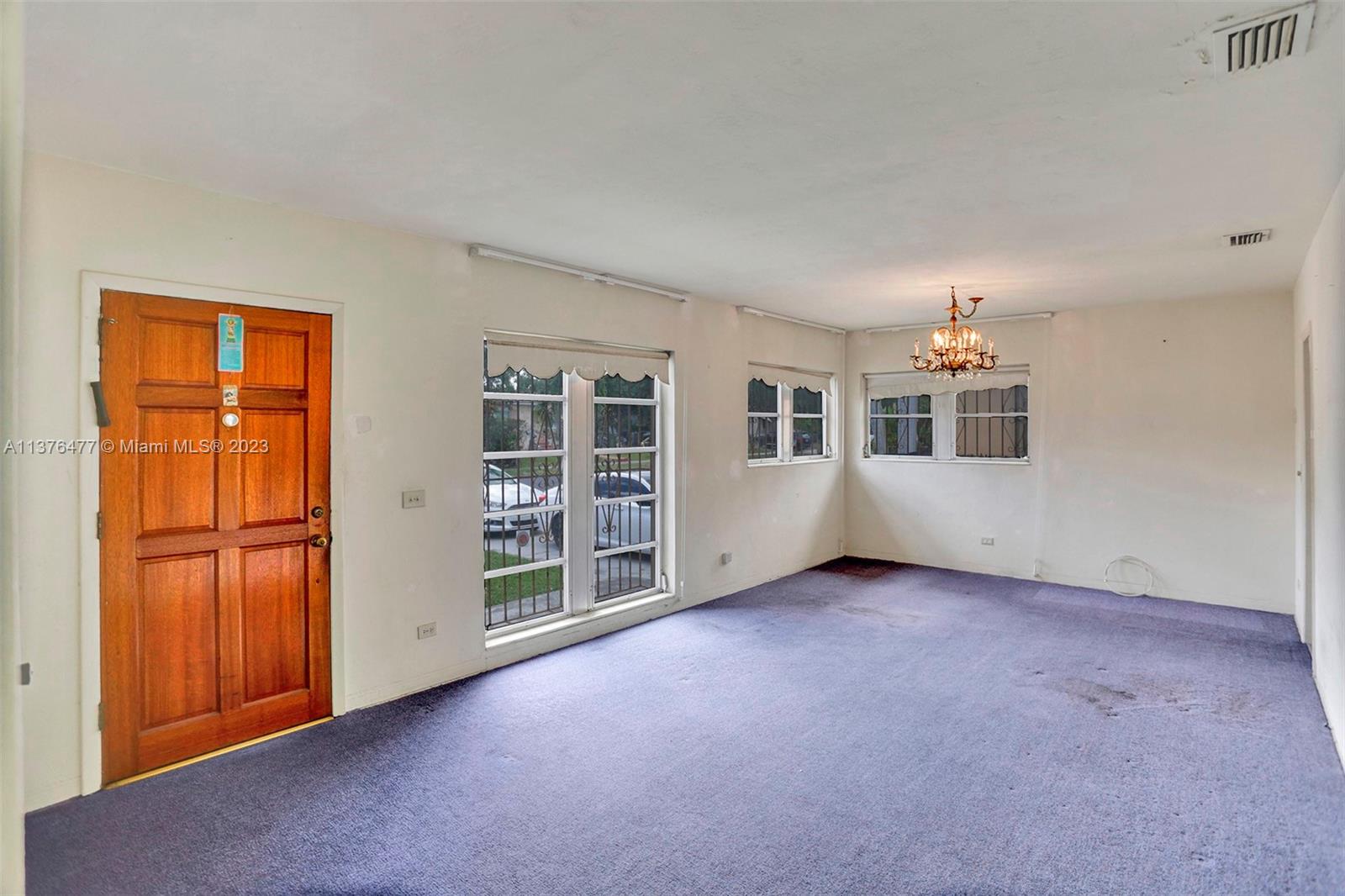 5171 Southwest 6th Street Miami, FL 33134 - Photo 5 of 45 an empty room with windows