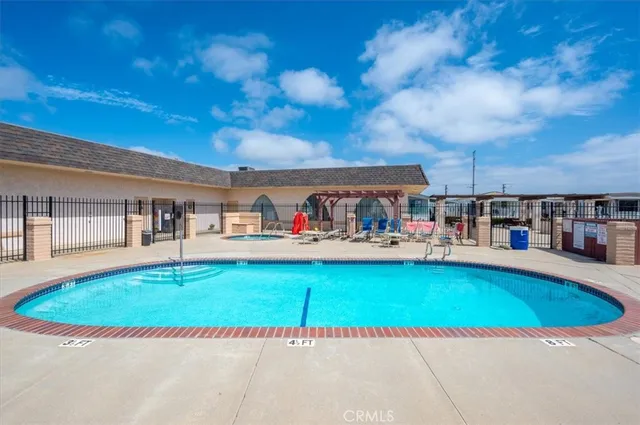 a view of swimming pool with a yard