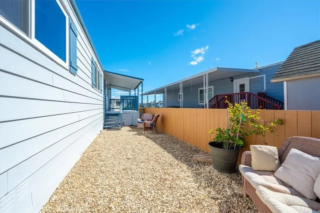 a view of a porch with furniture