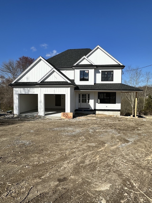 84 Pine Street Rehoboth, MA 02769 - Photo 2 of 29 a front view of a house with a yard