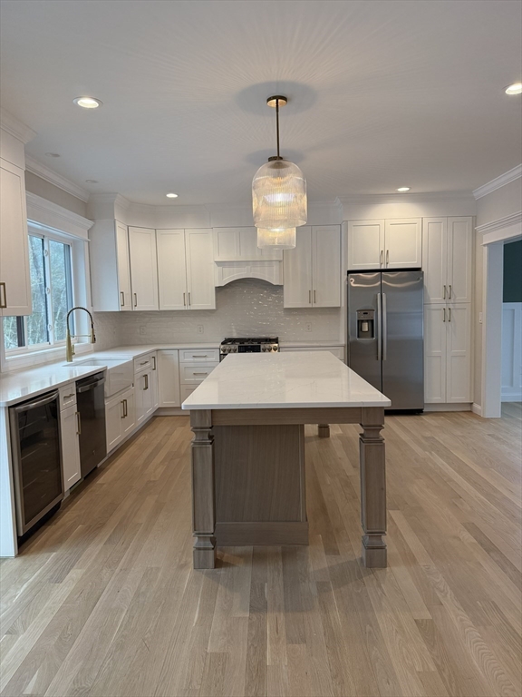 84 Pine Street Rehoboth, MA 02769 - Photo 4 of 29 a kitchen with a sink cabinets and wooden floor