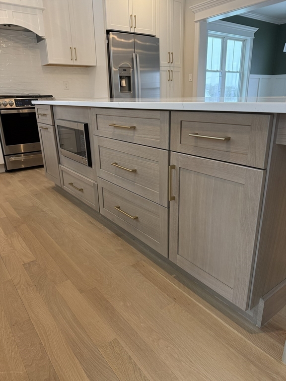 84 Pine Street Rehoboth, MA 02769 - Photo 7 of 29 a kitchen with white cabinets and white appliances