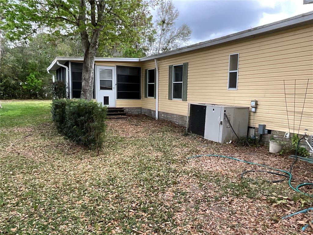 116 Traders Cove Boulevard DeBary, FL 32713 - Photo 11 of 60 a view of a house with backyard