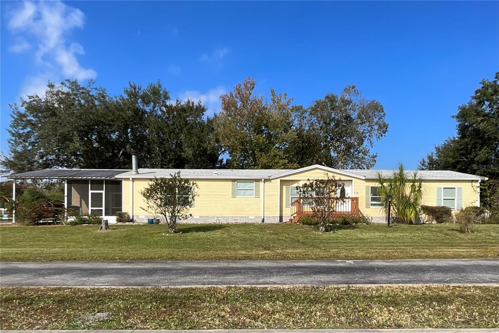 116 Traders Cove Boulevard DeBary, FL 32713 - Photo 2 of 60 a view front of house with a swimming pool