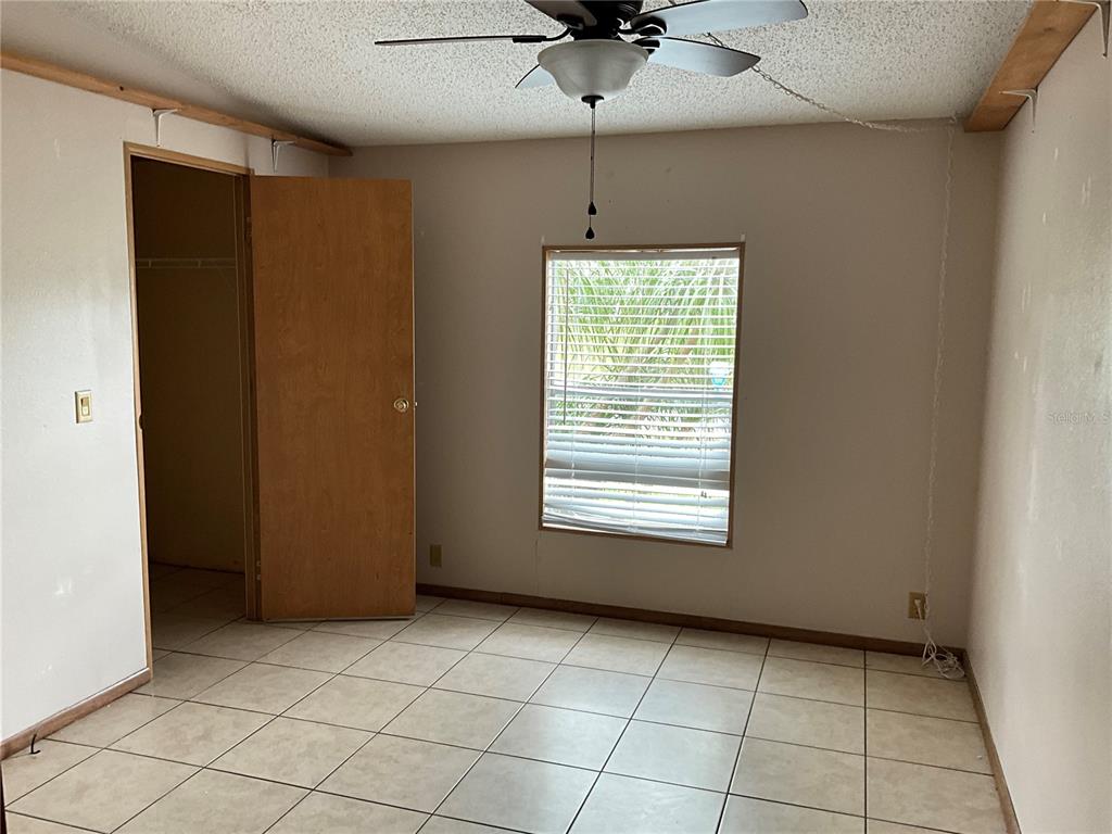 116 Traders Cove Boulevard DeBary, FL 32713 - Photo 37 of 60 a view of an empty room with a window
