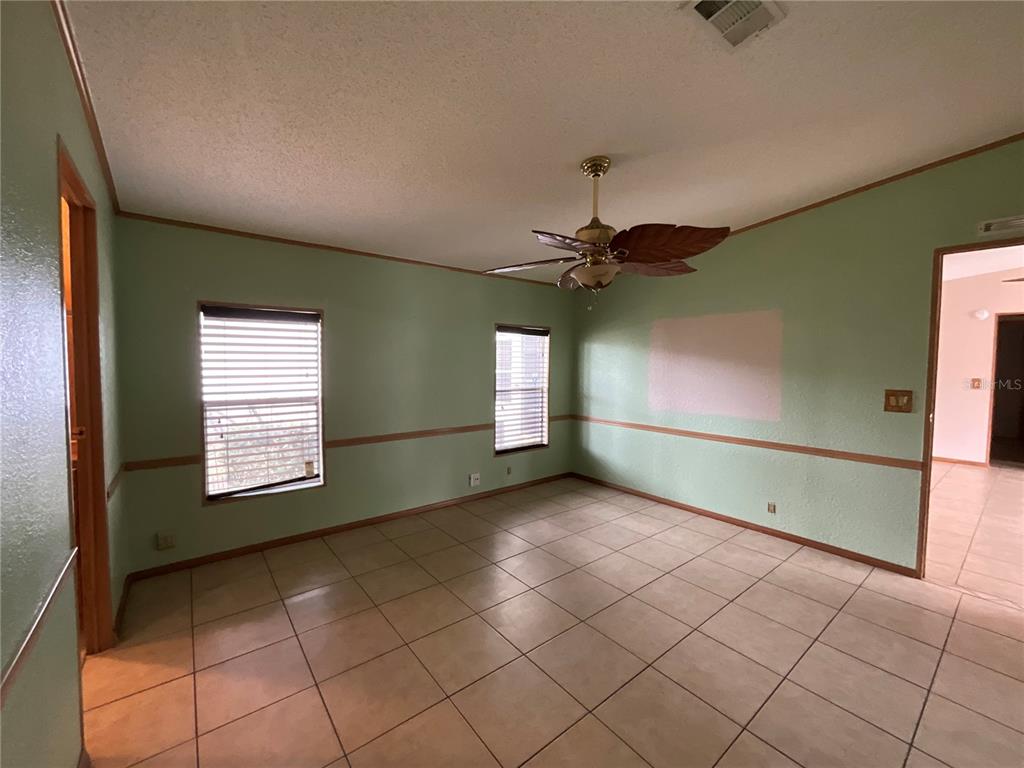116 Traders Cove Boulevard DeBary, FL 32713 - Photo 43 of 60 a view of an empty room with a window