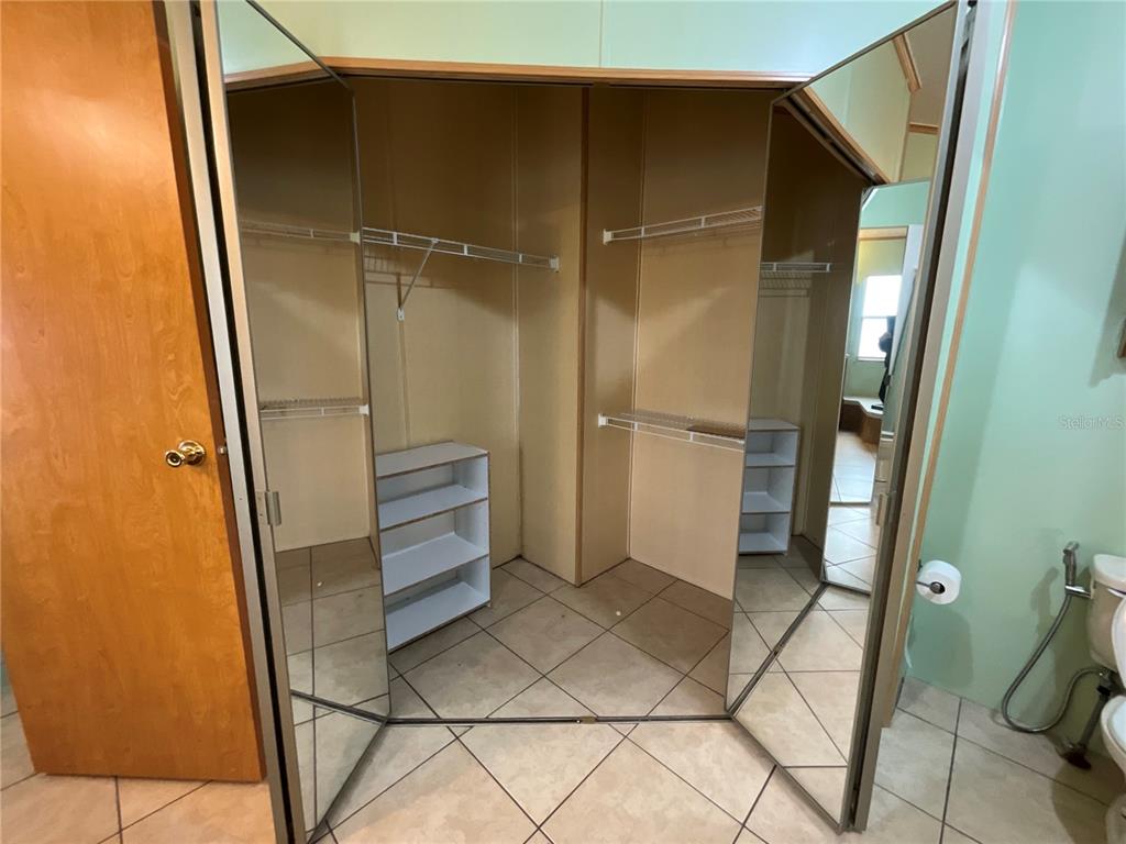 116 Traders Cove Boulevard DeBary, FL 32713 - Photo 48 of 60 a view of walk in closet