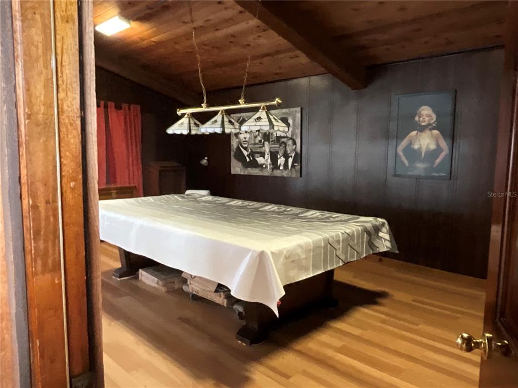 116 Traders Cove Boulevard DeBary, FL 32713 - Photo 53 of 60 a bed sitting in a bedroom next to a window