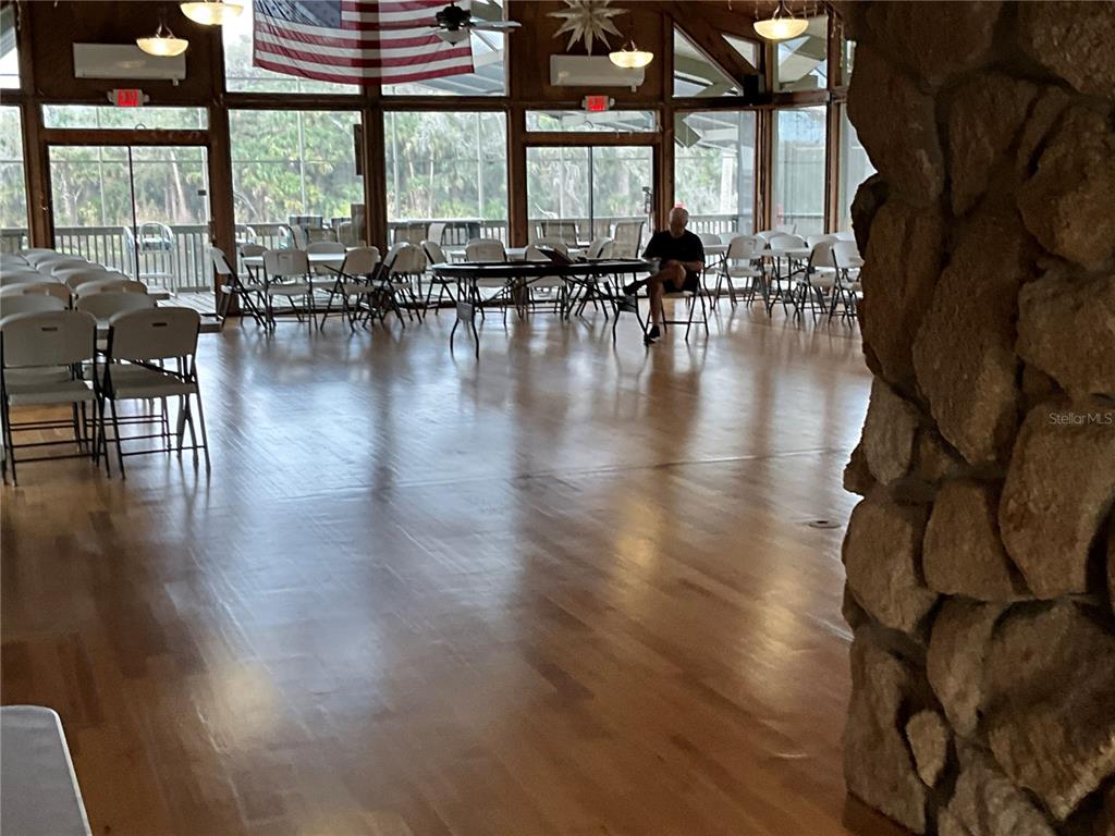 116 Traders Cove Boulevard DeBary, FL 32713 - Photo 54 of 60 a lobby with furniture and floor to ceiling windows