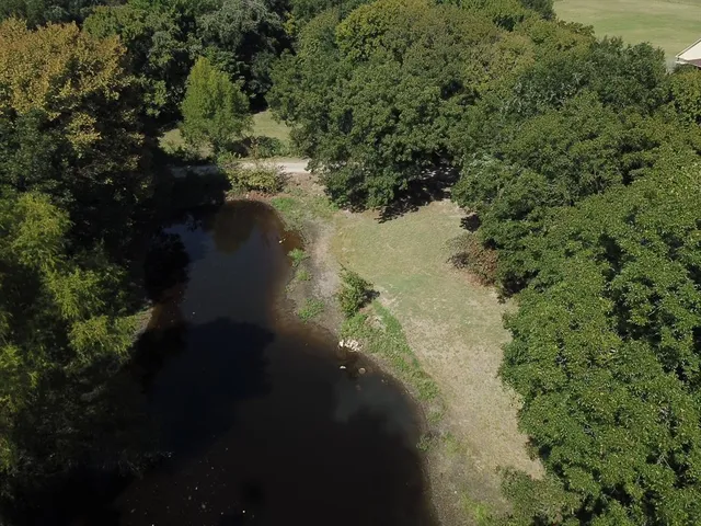 a view of a lake from a balcony