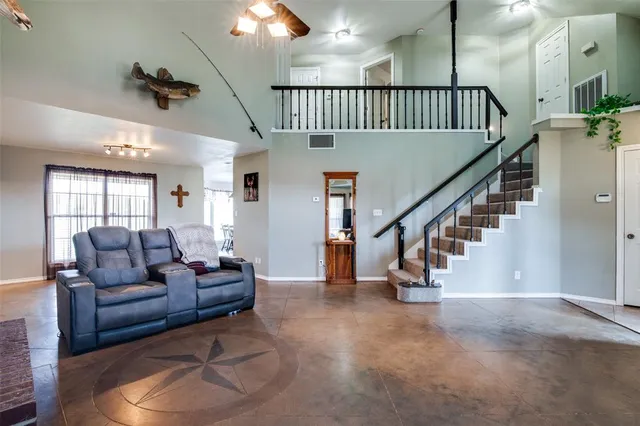 a view of livingroom with furniture and stairs