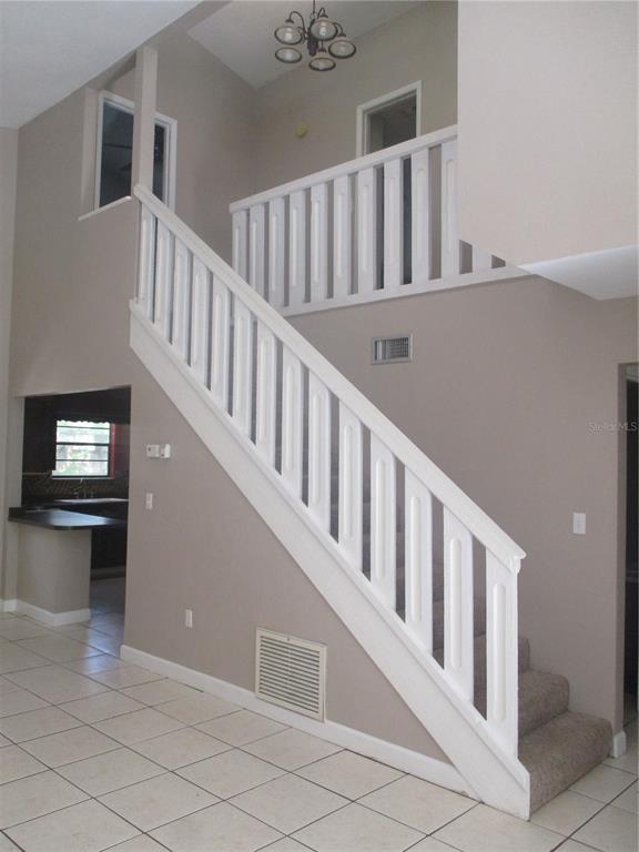 1120 Southwest 19th Place Gainesville, FL 32601 - Photo 5 of 30 a view of an entryway with wooden floor