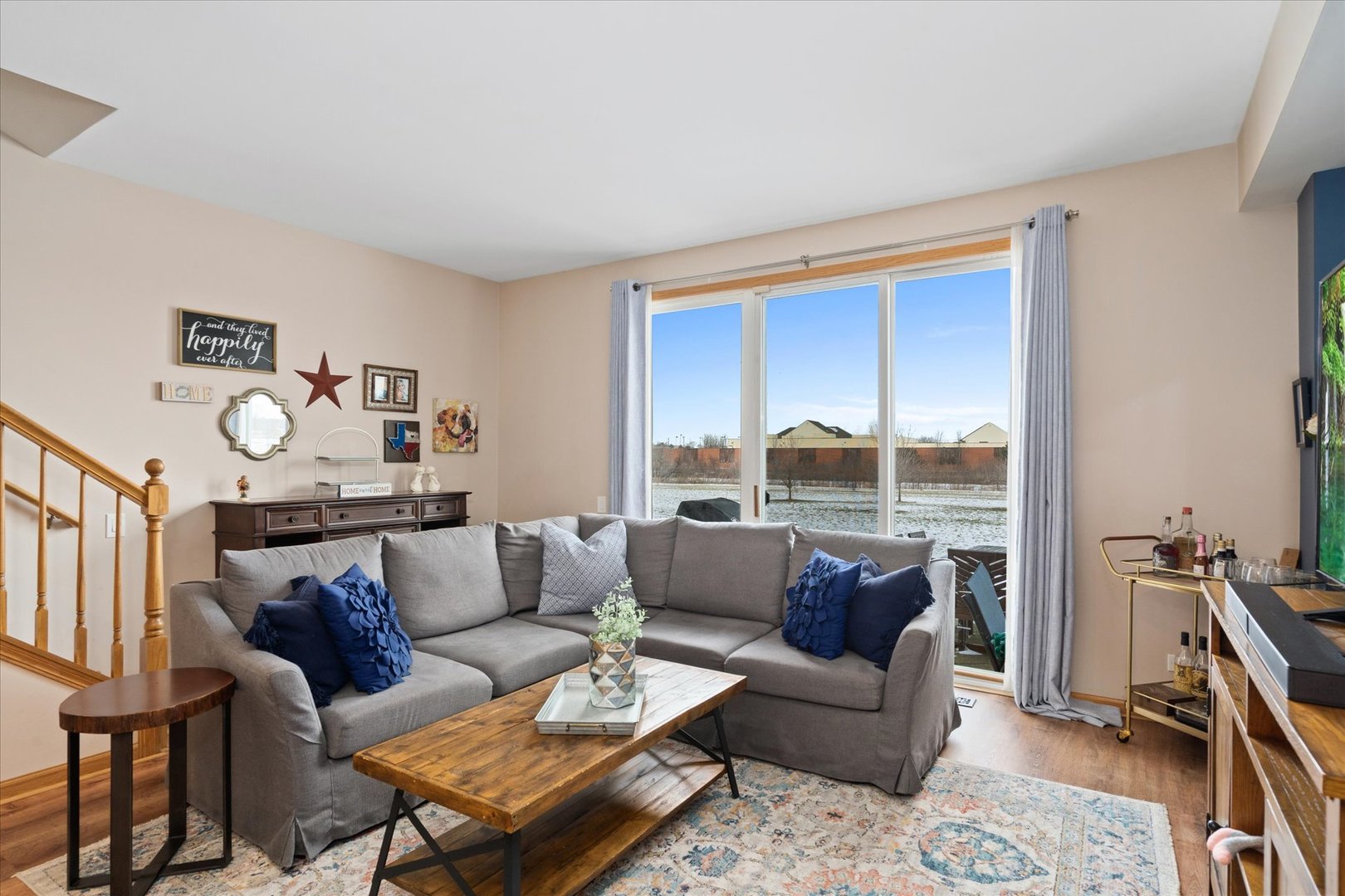 2609 Carrolwood Road, Unit 2609 Naperville, IL 60540 - Photo 9 of 17 a living room with furniture and a large window