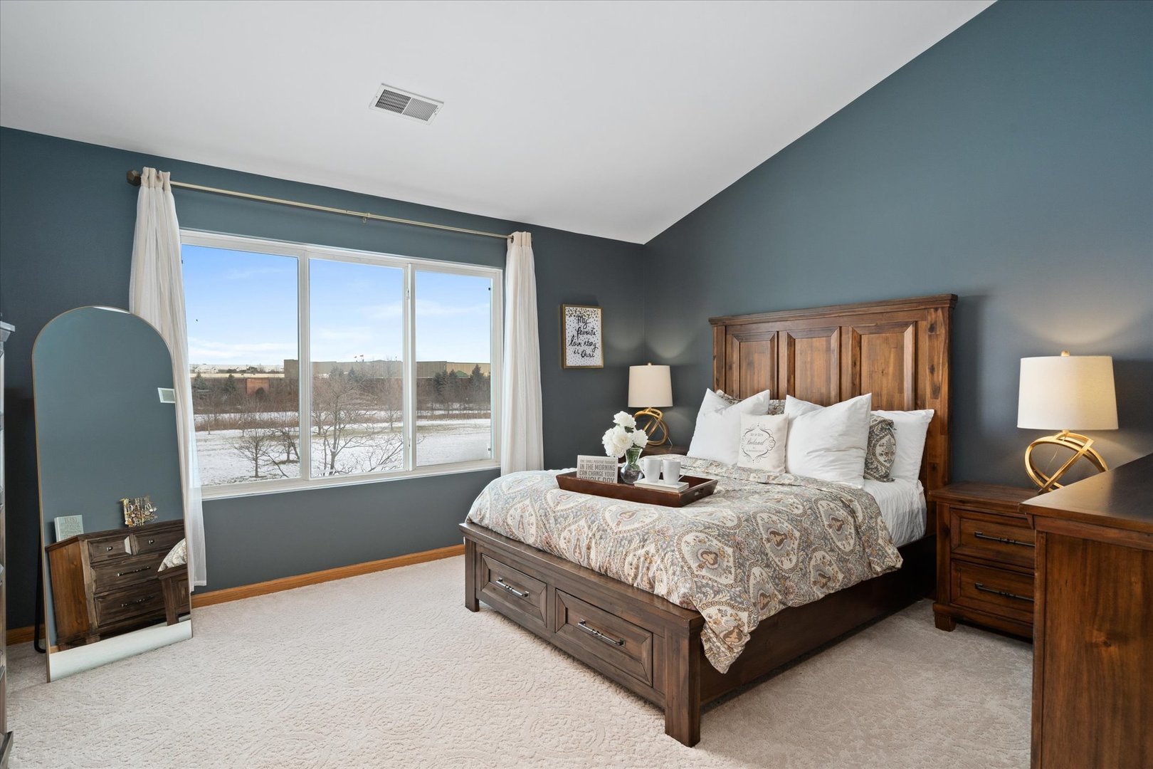 2609 Carrolwood Road, Unit 2609 Naperville, IL 60540 - Photo 10 of 17 a bed sitting in a bedroom next to a window