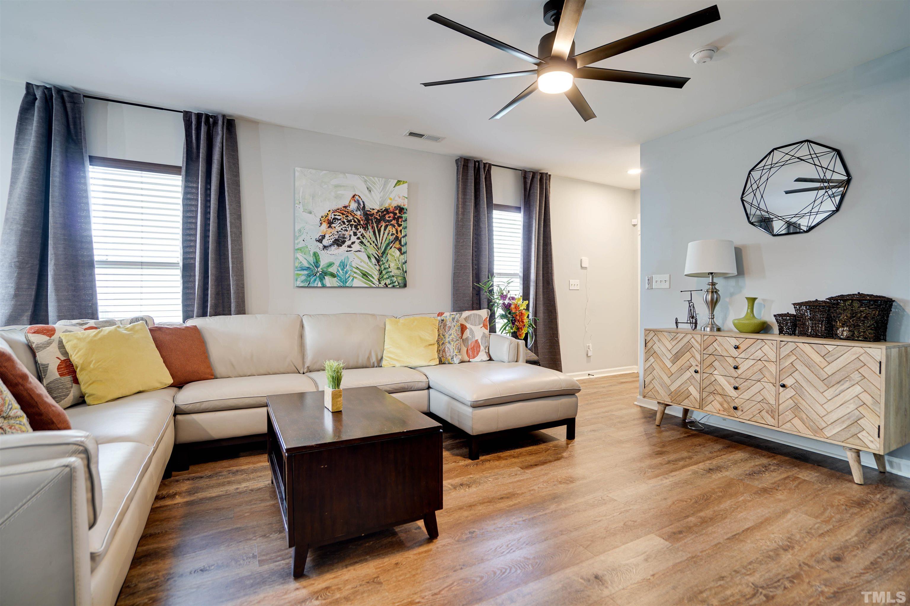 3626 Willano Way Raleigh, NC 27610 - Photo 4 of 20 a living room with furniture and a large window