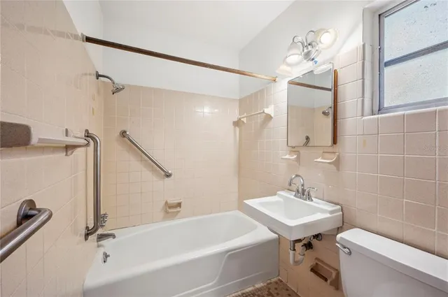 a view of a garden with an outdoor seating