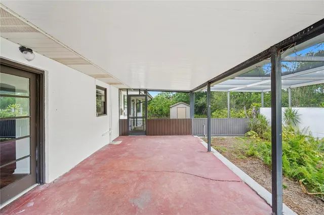 a bathroom with a sink a mirror and shower