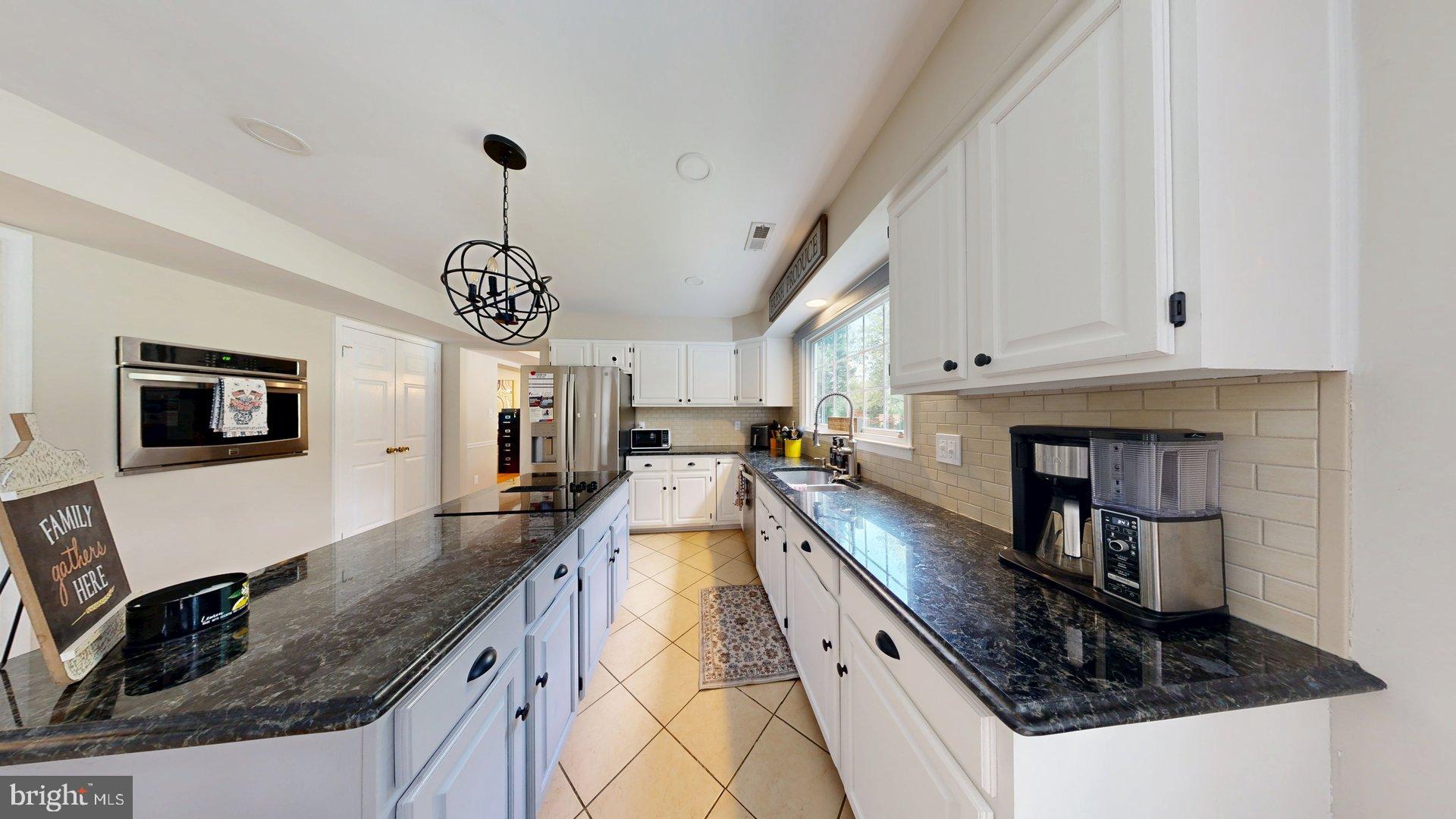 11901 Rustic Farm Court Germantown, MD 20874 - Photo 25 of 134 Spacious kitchen with modern finishes.
