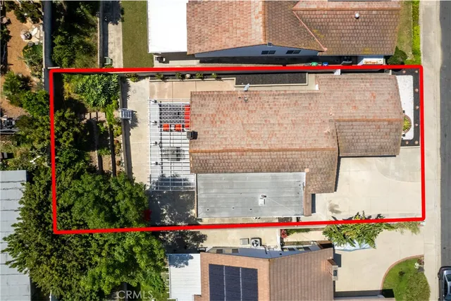 a front view of a house with yard and garage