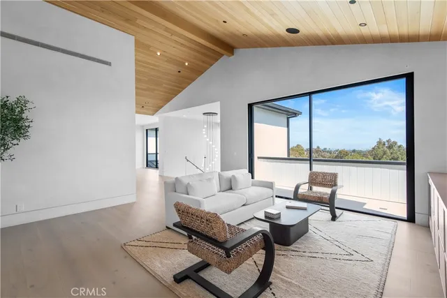 a large bathroom with a double vanity sink a mirror and a bathtub