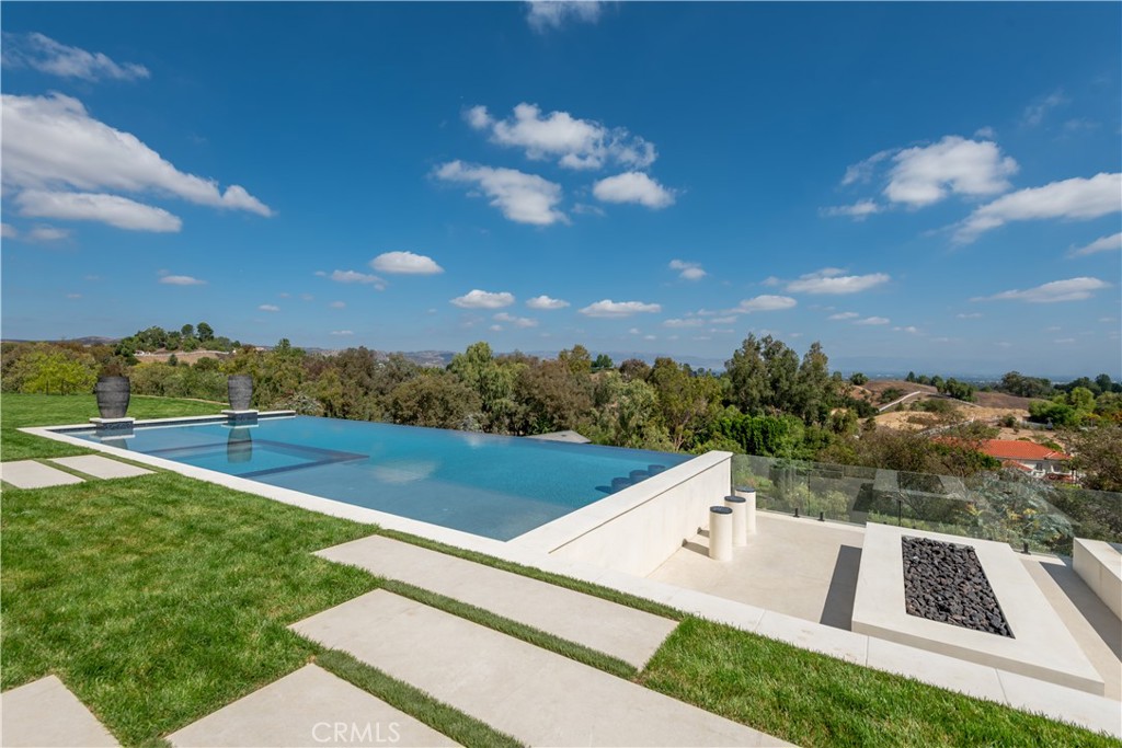 5340 Whitman Road Hidden Hills, CA 91302 - Photo 40 of 57 a view of an outdoor space and a yard