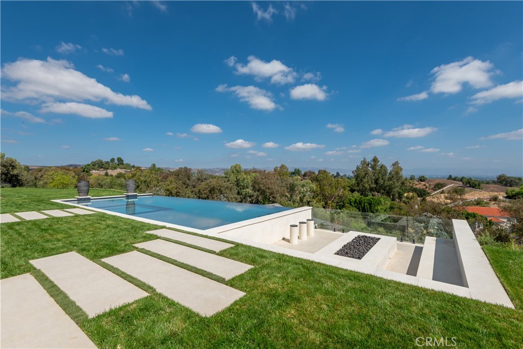 5340 Whitman Road Hidden Hills, CA 91302 - Photo 40 of 57 a view of a house with a yard