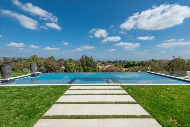 an aerial view of a house with a garden