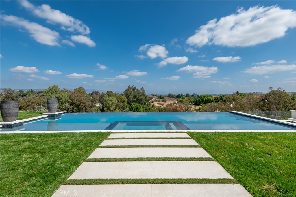 5340 Whitman Road Hidden Hills, CA 91302 - Photo 42 of 57 a view of building with garden