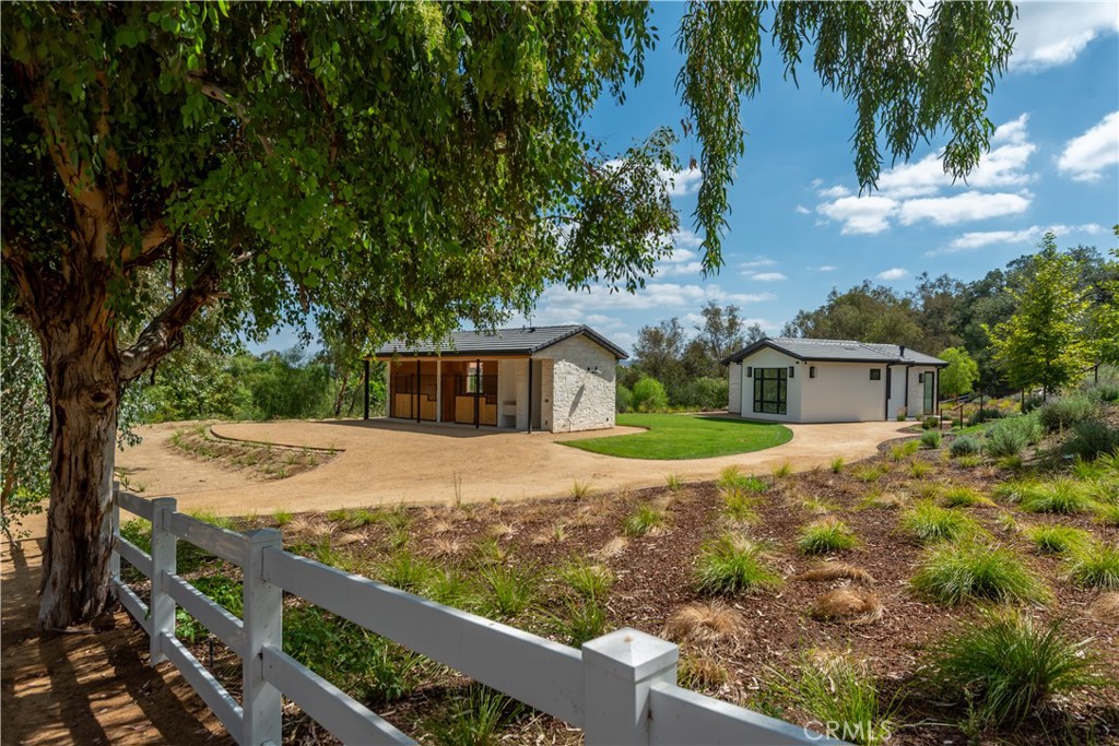 5340 Whitman Road Hidden Hills, CA 91302 - Photo 45 of 57 a view of a house with a yard