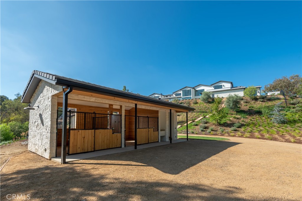 5340 Whitman Road Hidden Hills, CA 91302 - Photo 49 of 57 a view of a large building