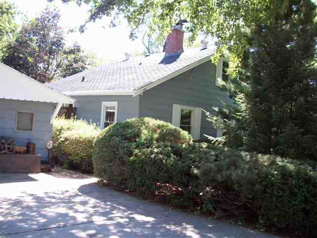 100 North Cottage Avenue Normal, IL 61761 - Photo 1 of 1 a view of a house with a yard and plants