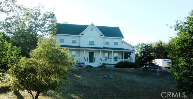 32134 Sunset Ridge Road East Coarsegold, CA 93614 - Photo 1 of 1 Farmhouse style home offers lot of charm~