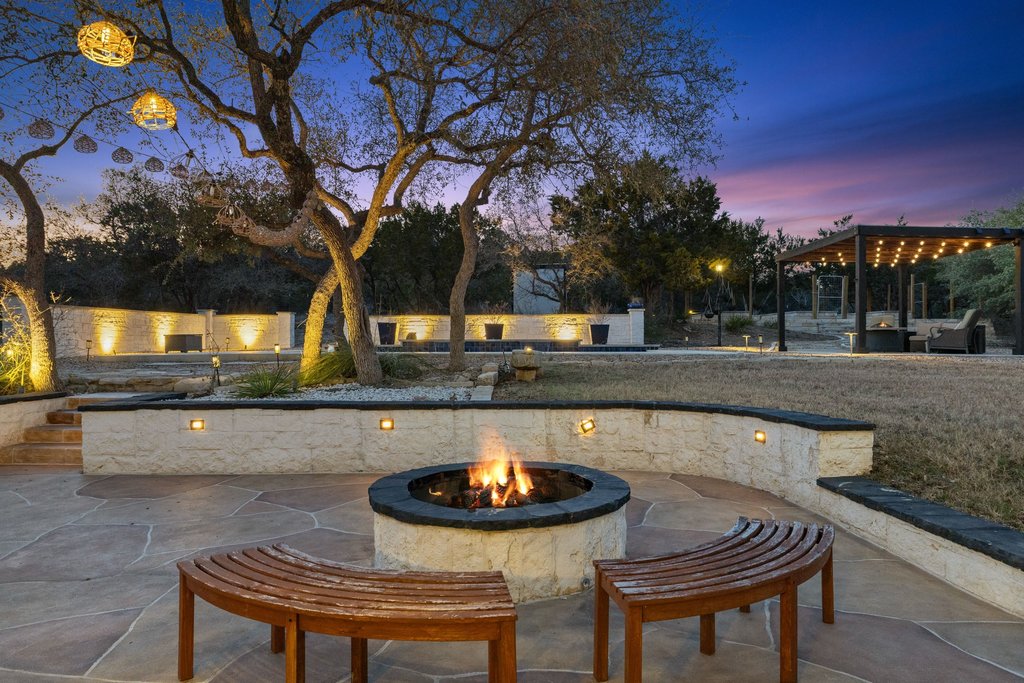 4018 Bee Creek Road Spicewood, TX 78669 - Photo 12 of 40 Gather around the fire pit for s'mores and cozy Hill Country nights.
